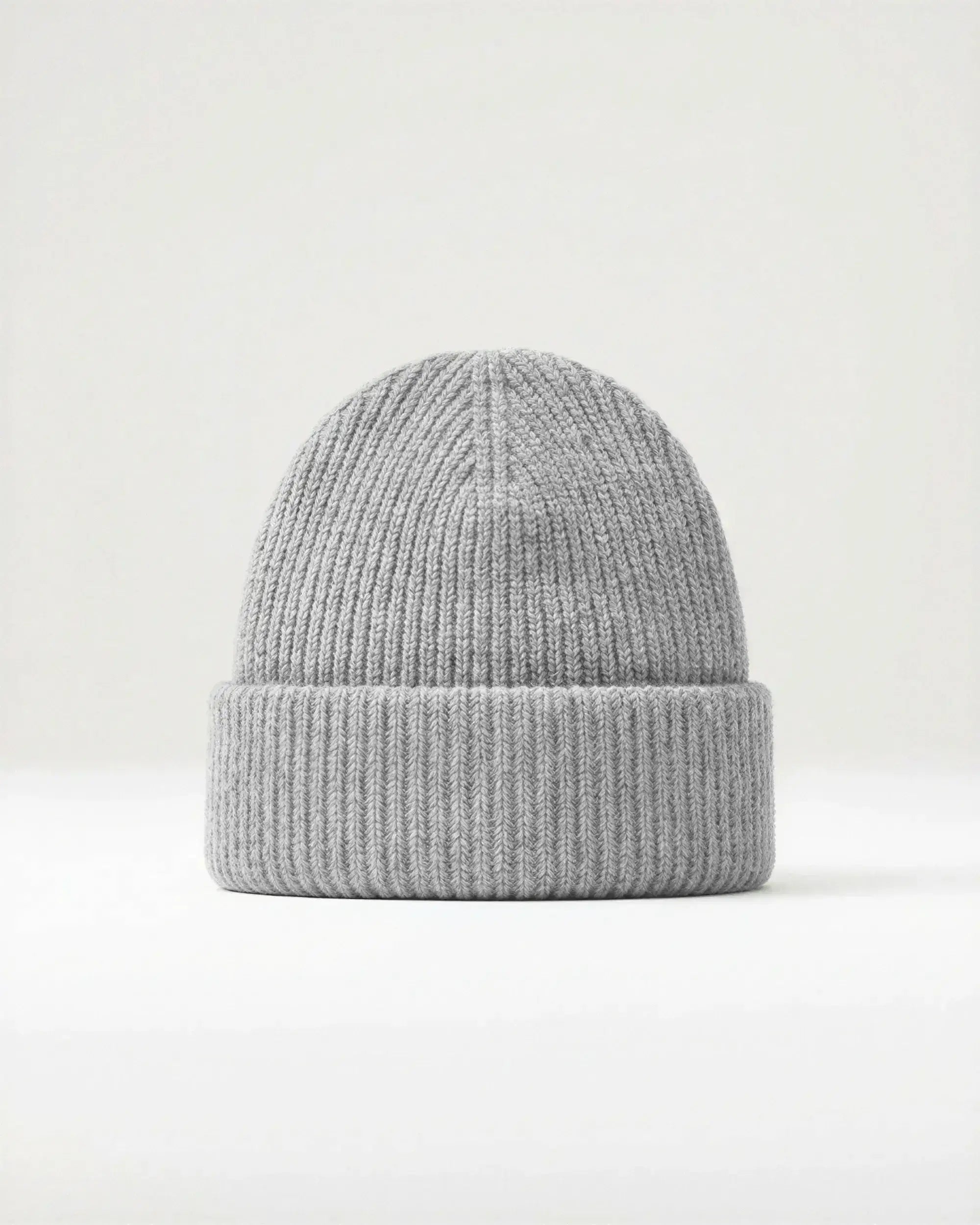 Gray knit beanie on a white background