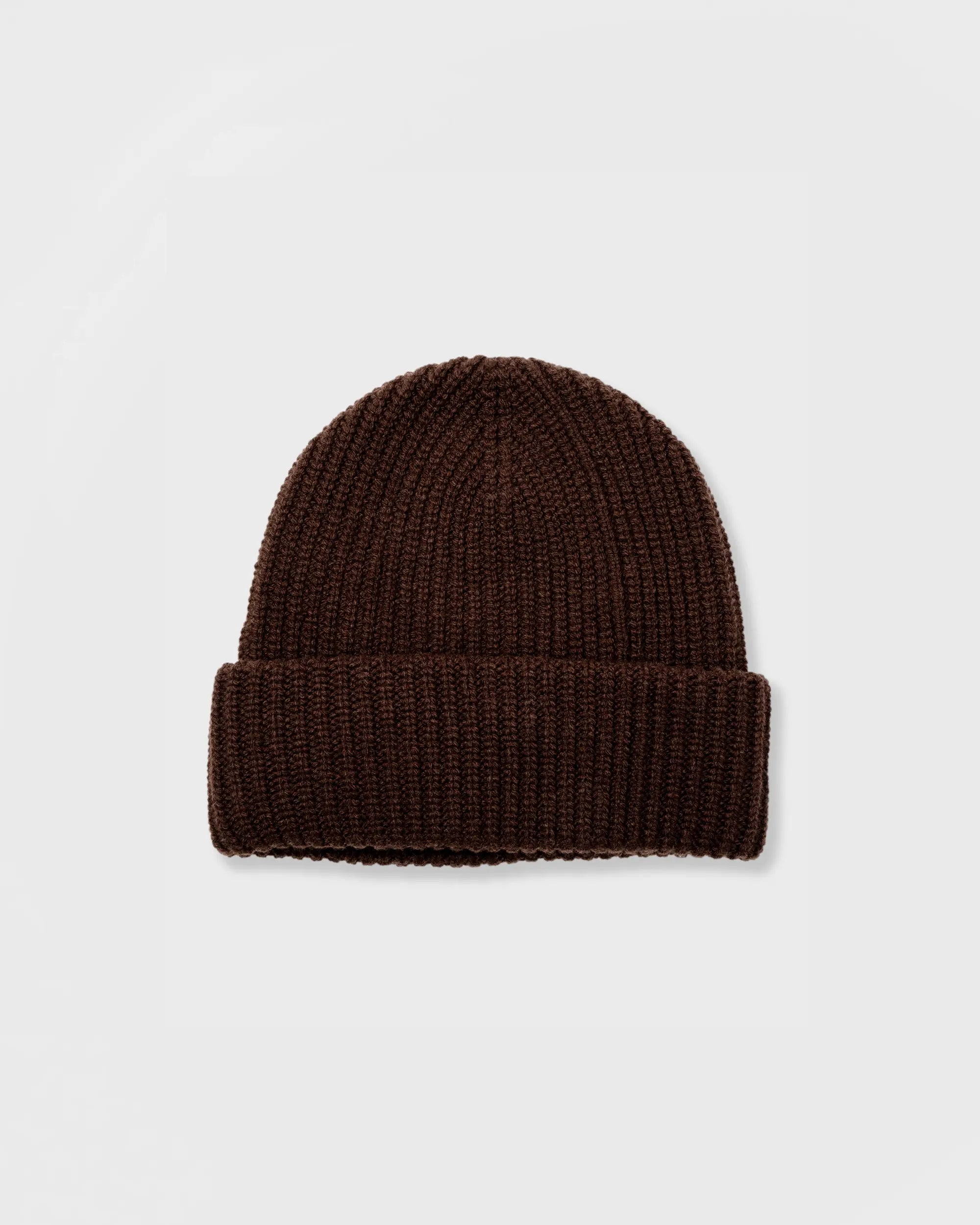 Brown knit beanie on a light gray background