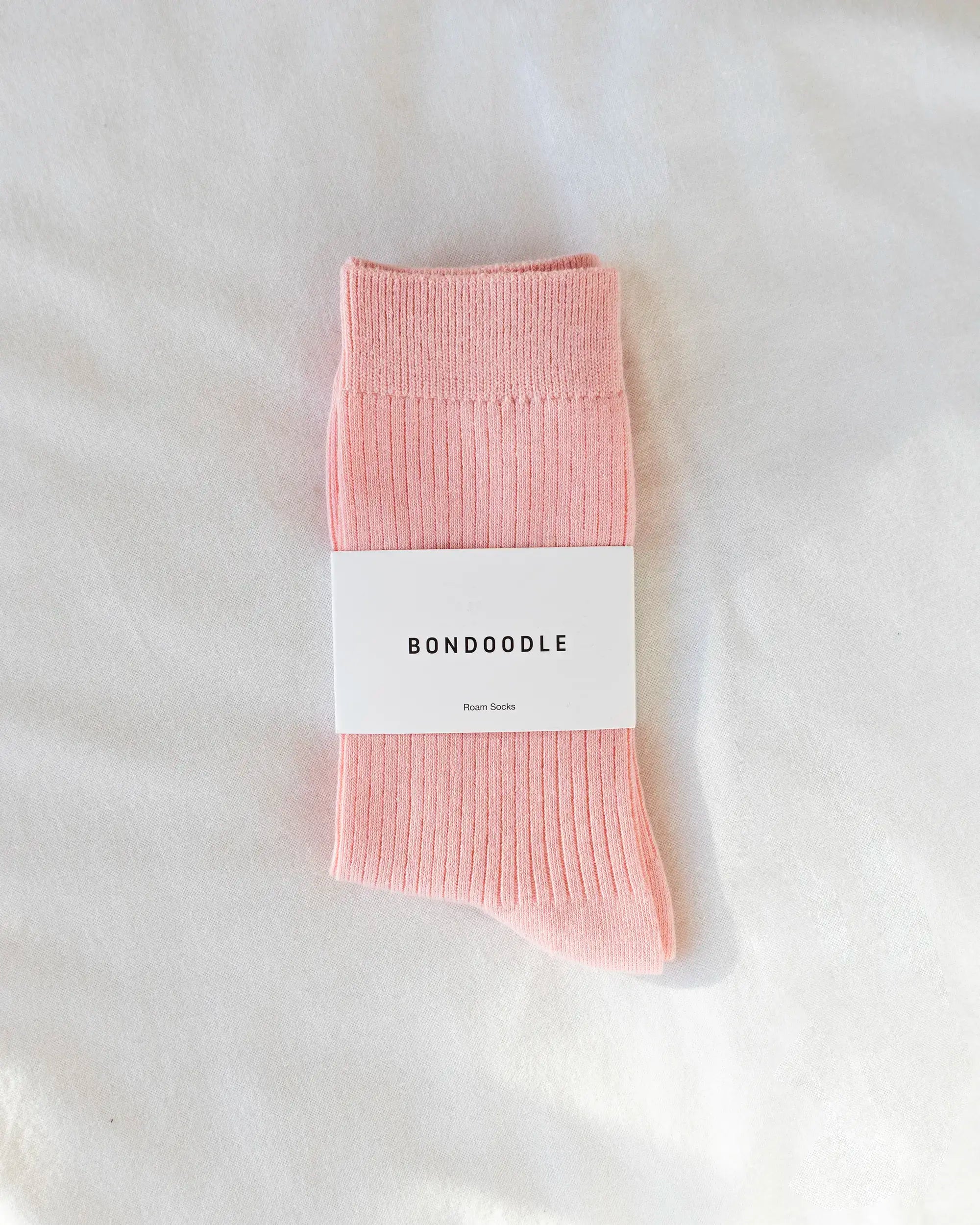 Light pink bondoodle cotton roam socks on a white background